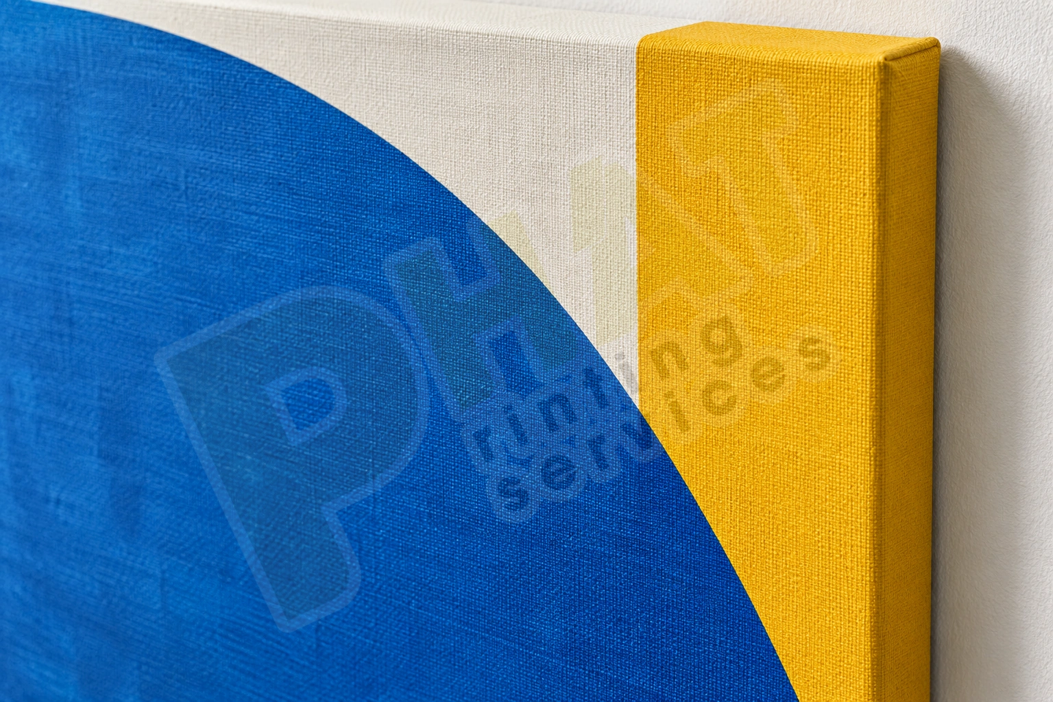 Cận Canvas có mảng xanh vàng trắng, thấy vân dệt và cạnh ôm ảnh